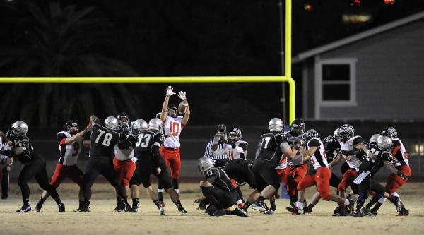 Las Vegas’ Antonio Jauregui (10) leaps to try to block a field goal attempt by Green V ...