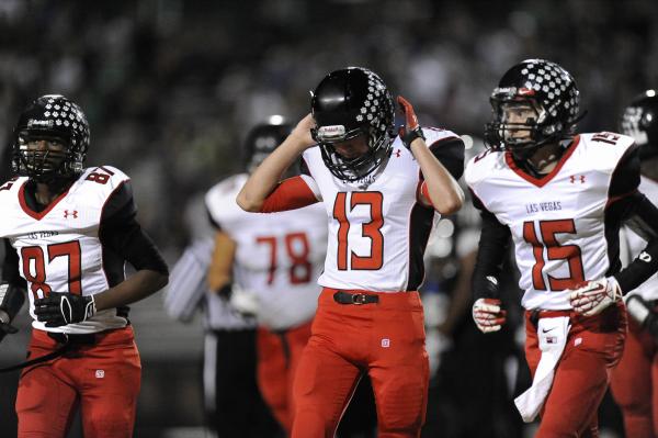 Las Vegas quarterback Trevor Swenson (13) reacts after throwing an interception in the first ...