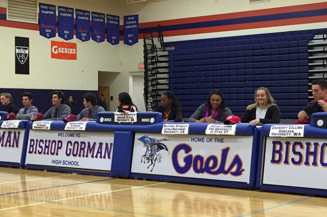 Bishop Gorman senior athletes sign their National Letters of Intent in the school‘s gy ...