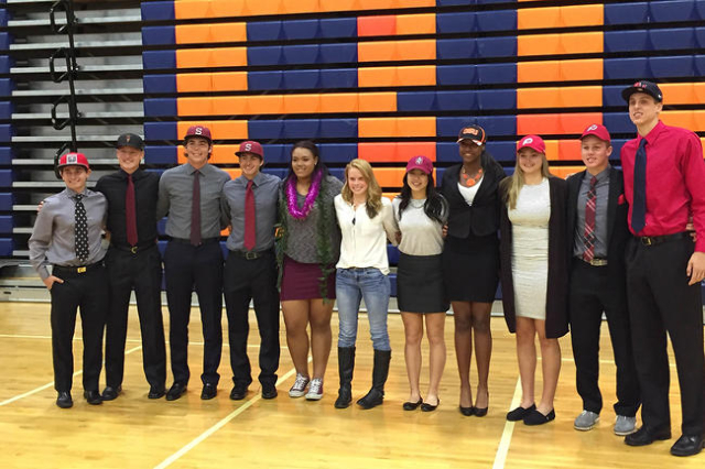 All eleven Bishop Gorman student-athletes pose after signing their National Letters of Inten ...