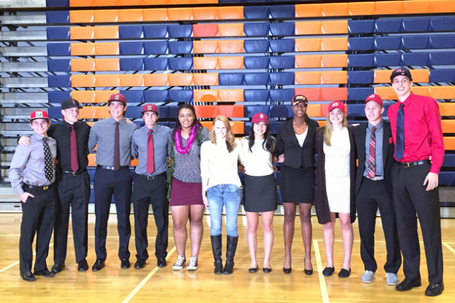 All eleven Bishop Gorman student-athletes pose after signing their National Letters of Inten ...