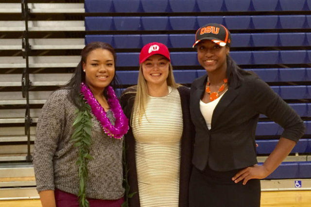 Bishop Gorman girls basketball players (from left) Raychel Stanley, Megan Jacobs and Madison ...