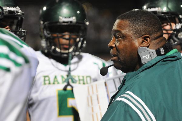 Rancho coach Tyrone Armstrong addresses his players on Friday during a game against Clark.