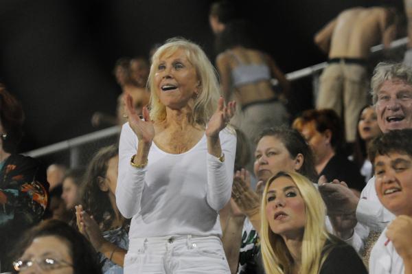 Susan Spencer, former Philadelphia Eagles GM, cheers for Rancho during a game at Clark on Fr ...