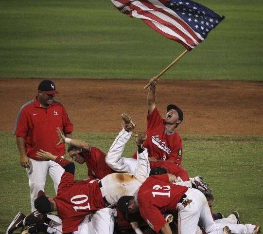 Liberty players celebrate their win over Cimarron-Memorial in the American Legion state cham ...