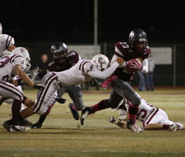 Cimarron-Memorial wide receiver Djon Watson breaks a tackle in the first quarter on Friday a ...