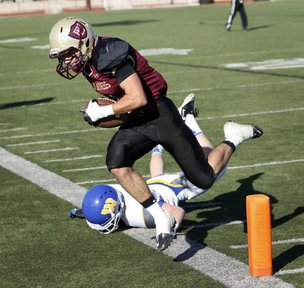 Faith Lutheran player Jake Berdan makes a reception near the end zone on Saturday against Lo ...