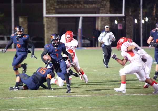 Bishop Gorman running back Daniel Stewart (1) carries the ball during the second quarter on ...