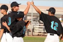 Silverado senior pitcher David Kuzma, left, fist-bumps senior teammate Thomas Licea after th ...