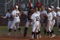 Cimarron-Memorial players celebrate after defeating Arbor View