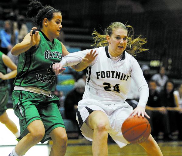 Foothill’s Gabby Doxtator, right, drives by Milena Palor of Green Valley on Tuesday ni ...