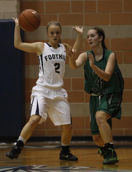 Foothill’s Mikayla Yeakel, left, defends Green Valley’s Brooke Haney on Tuesday.