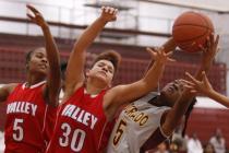 Eldorado’s Paige Thomas (5) battles for a rebound against Valley’s Angie Sanchez ...