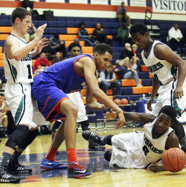 Gorman’s Chase Jeter (4) and Sheldon’s L.J. Williams (5) scramble for a loose ba ...