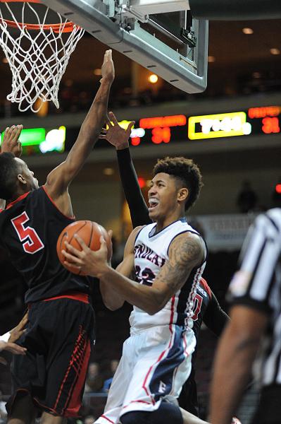 Findlay Prep basketball player Kelly Oubre goes in for a layup against Terrance Ferguson (5) ...