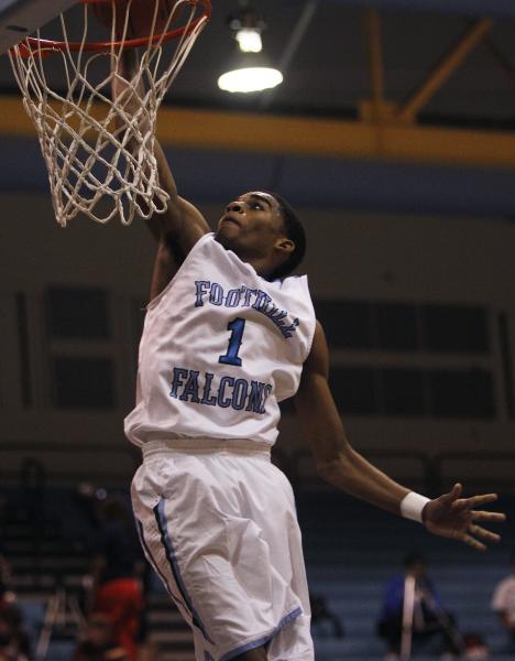 Foothill’s Jalen Shepard (1) dunks against Desert Pines on Thursday. Shepard had 11 po ...