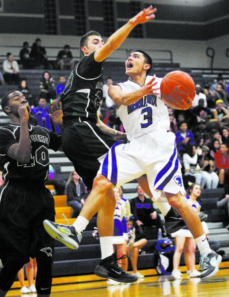 Sierra Vista’s Mikko Balmes (3) drives past Palo Verde’s Taylor Miller (22) on T ...