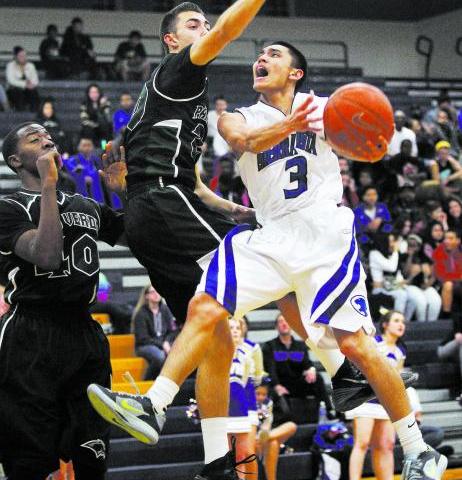 Sierra Vista’s Mikko Balmes (3) drives past Palo Verde’s Taylor Miller (22) on T ...