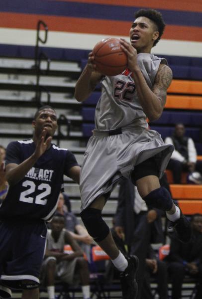 Findlay Prep’s Kelly Oubre (22) goes to the hoops against  Impact Academy’s ...
