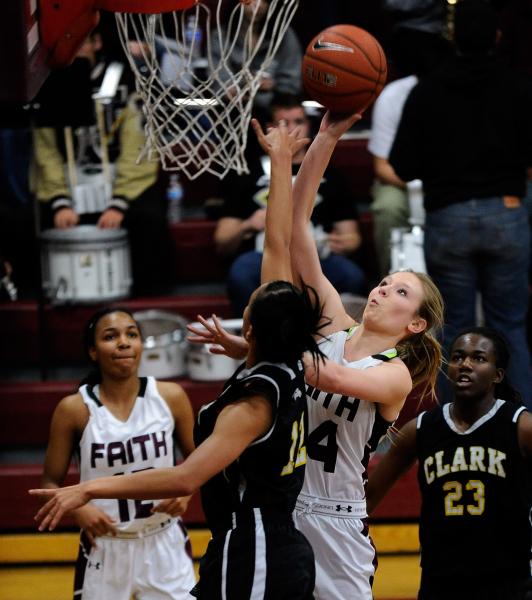 Faith Lutheran’s Morgan Hill shoots against Clark’s Bobbi Floyd as Faith Luthera ...