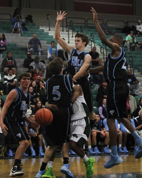 The Foothill defense surrounds Palo Verde’s Braxton Richards (1) on Tuesday. Foothill ...