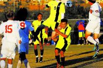 Green Valley’s Kade Kochevar (9) attempts a header against Liberty on Tuesday in the S ...