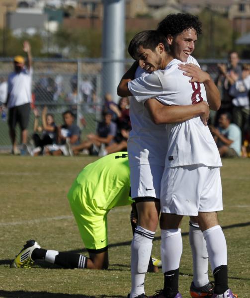 Eldorado’s Chris Perez (8) and Andres Lua embrace after teaming for a second-half goal ...