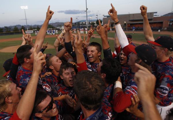 Coronado players celebrate following their 7-4 win over Bishop Gorman in the Division I stat ...