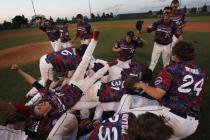 Coronado players celebrate after beating Bishop Gorman 7-4 in the Division I state baseball ...