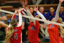Coronado’s Cali Thompson (14) tips the ball over the net against Bishop Gorman during ...