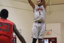 Findlay Prep’s Rashad Vaughn (1) shoots a 3-point shot in front of Planet Athlete&#821 ...