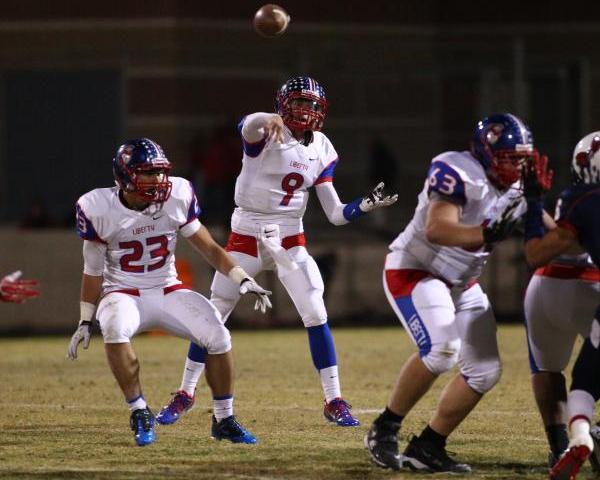 Liberty quarterback Tyler Newman, seen throwing a pass against Coronado, leads the area with ...