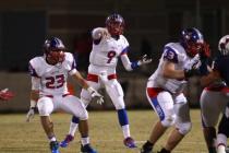 Liberty quarterback Tyler Newman, seen throwing a pass against Coronado, leads the area with ...