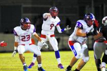 Liberty quarterback Tyler Newman (9) throws a pass in Liberty’s 45-27 victory over Cor ...