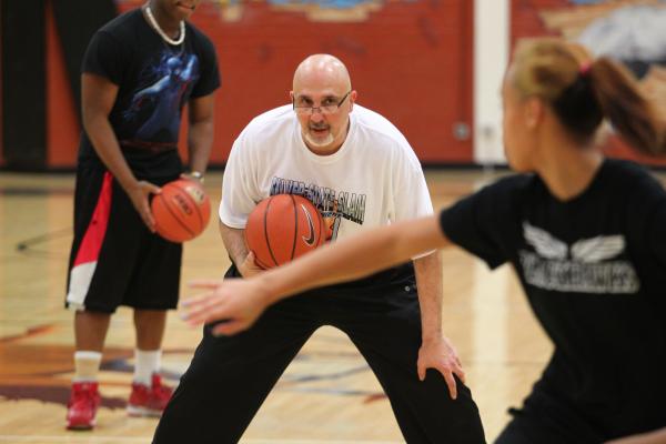 Clark girls basketball head coach Mike Moulchin leads practice on Monday.
