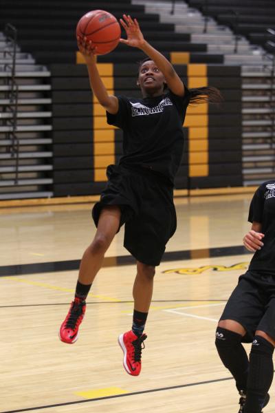 Clark’s Caliyah Bowman goes for a layup during practice.
