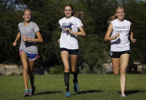The Meadows’ Gosse triplets — from left, Bailey, Delaney and Cassidy — shown Friday be ...