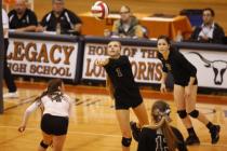Stephanie Herman (1) looks to send the ball over the net against Bishop Gorman during the ch ...