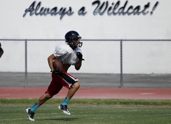 Las Vegas running back, center, shown Tuesday t practice, rushed for 1,211 yards and 13 TDs ...
