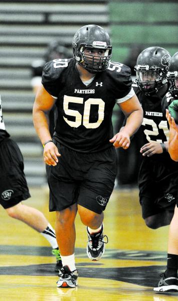 Palo Verde Panthers lineman Michael Hughes runs drills during football practice on Friday. H ...
