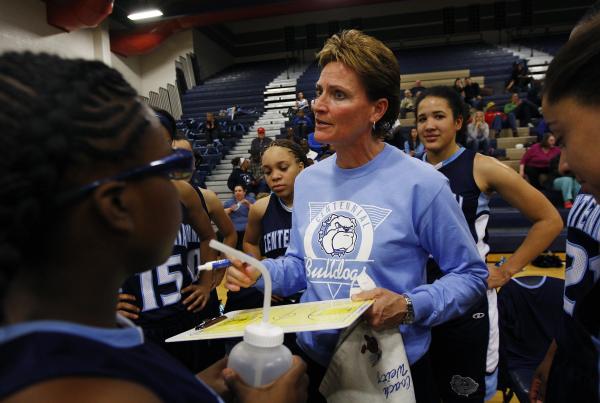 Centennial girls basketball coach Karen Weitz makes her point during a timeout of her team&# ...
