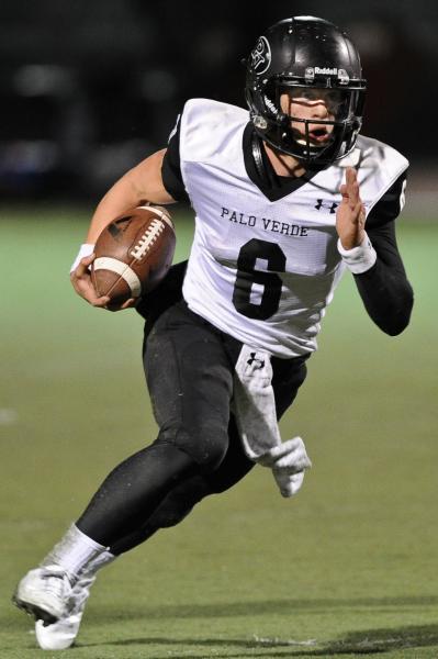 Palo Verde quarterback Parker Rost (6) runs with the ball on Friday during the Panthers&#821 ...