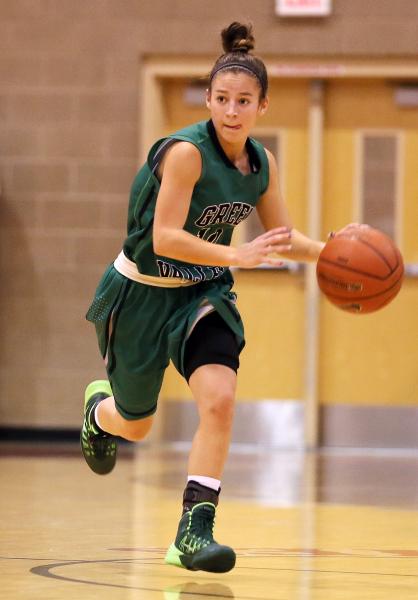 Green Valley senior Maggie Manwarren pushes the ball down the floor on Monday night.