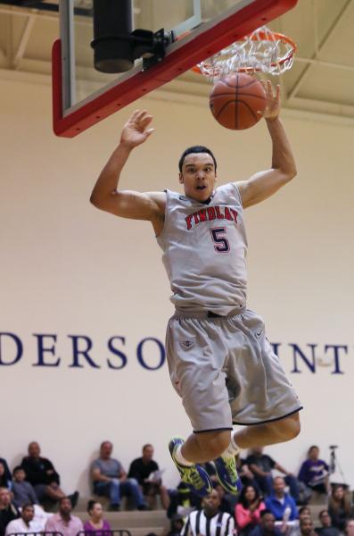 Findlay Prep’s Dillon Brooks finishes off a dunk during the Pilots’ game against ...