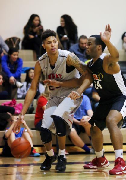 Findlay Prep’s Kelly Oubre (22) looks for room against PHASE 1 Academy’s Lincoln ...
