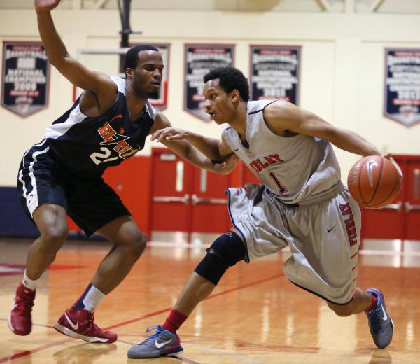 Findlay Prep’s Rashad Vaughn (1) tries to get by PHASE 1 Academy’s Lincoln Samue ...
