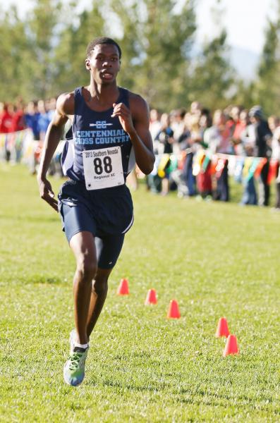 Centennial’s Dajour Braxton prepares to cross the finish line in first place Saturday.
