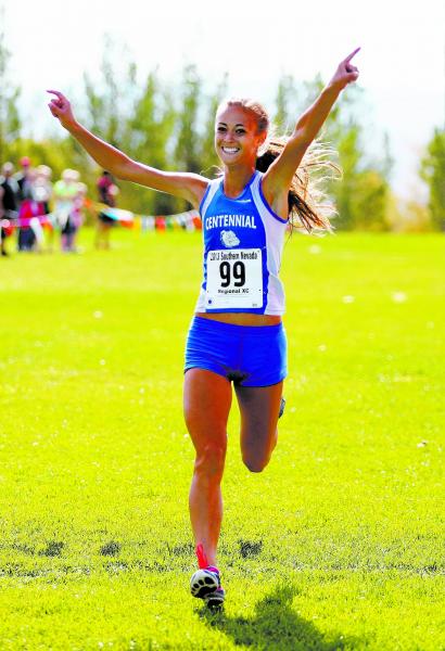 Centennial senior Sydney Badger crosses the finish line Saturday to win the Division I Sunse ...