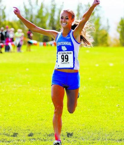 Centennial senior Sydney Badger crosses the finish line Saturday to win the Division I Sunse ...