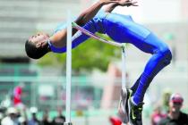 Bishop Gorman’s Randall Cunningham clears the bar during high jump competition on Satu ...